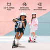 Two children ride scooters ik1s enthusiastically on a colorful playground, with one on a black scooter and the other on a pink one, both wearing white helmets. Text above highlights features: 3.0-4.3 miles range, 33 minutes of fun, and a 100W motor.