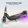 A sleek electric scooter ik1s with a black and red deck labeled "Scooter," featuring vibrant colored ambient lights on the front wheel and side.
