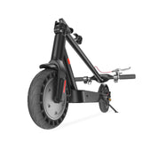 A sleek black electric scooter E9Tmax with a sturdy frame is shown from a low angle, highlighting its large front wheel and handlebars.