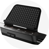 A close-up of a treadmill JT51 control panel with a textured black phone holder above it. The panel features buttons for start/stop, speed adjustment, and other functions, set against a sleek black surface.