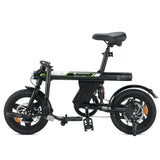 A compact black electric bike with a sturdy frame and small wheels is shown in profile. It features a comfortable saddle, disc brakes, and a kickstand. The bike has green and white branding on the frame, adding a modern touch.