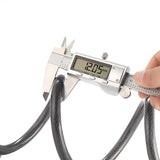 A digital caliper measuring the diameter of a black cable, displaying 12.05 mm on its screen, with a hand holding the tool against a white background.