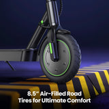 Electric scooter with 8.5-inch air-filled road tires on a dark background