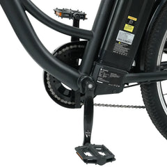 Close-up of an electric bike's central frame showing the black battery pack, pedal, and chain mechanism, with visible labels and a sturdy black finish.