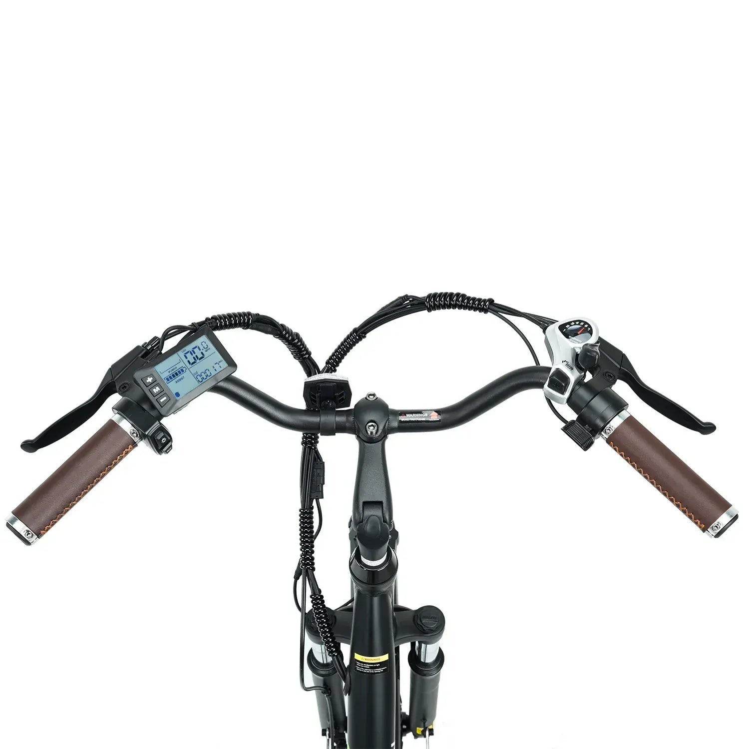 The handlebars of a bicycle are shown, featuring brown leather grips, a digital display on the left, and gear controls on the right, with coiled cables extending from the center.