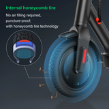 Close-up of an e9pro electric scooter's front wheel featuring a blue honeycomb tire, with nails illustrating its puncture-proof design. A diagram shows the tire's internal structure, highlighting its airless, durable technology.