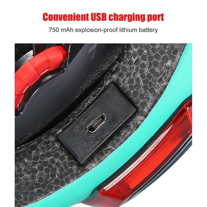 Close-up of a USB charging port on a device with a textured black surface and turquoise trim, featuring a red accent. Text above highlights a 750 mAh explosion-proof lithium battery.