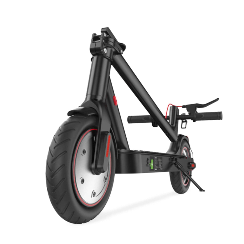 A folded state sleek black electric scooter i8 is shown from a low angle, highlighting its sturdy frame and large, treaded front wheel. The handlebars are visible in the background, and the scooter is equipped with a kickstand.