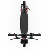 Top view of a black electric scooter ix4 with red accents, showing the handlebars, deck with a textured pattern, and front wheel.