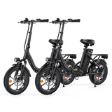 Two black electric bicycles on a white background