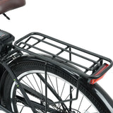 A black bicycle rear rack is attached above a sturdy tire with a fender, featuring a simple, open-frame design and a red reflector at the back.