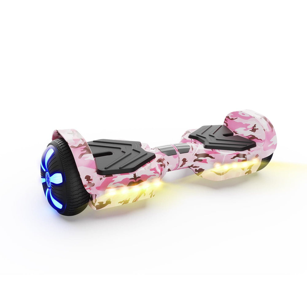 The H2 Pink hoverboard glowing with bright LED lights in a low-light setting.