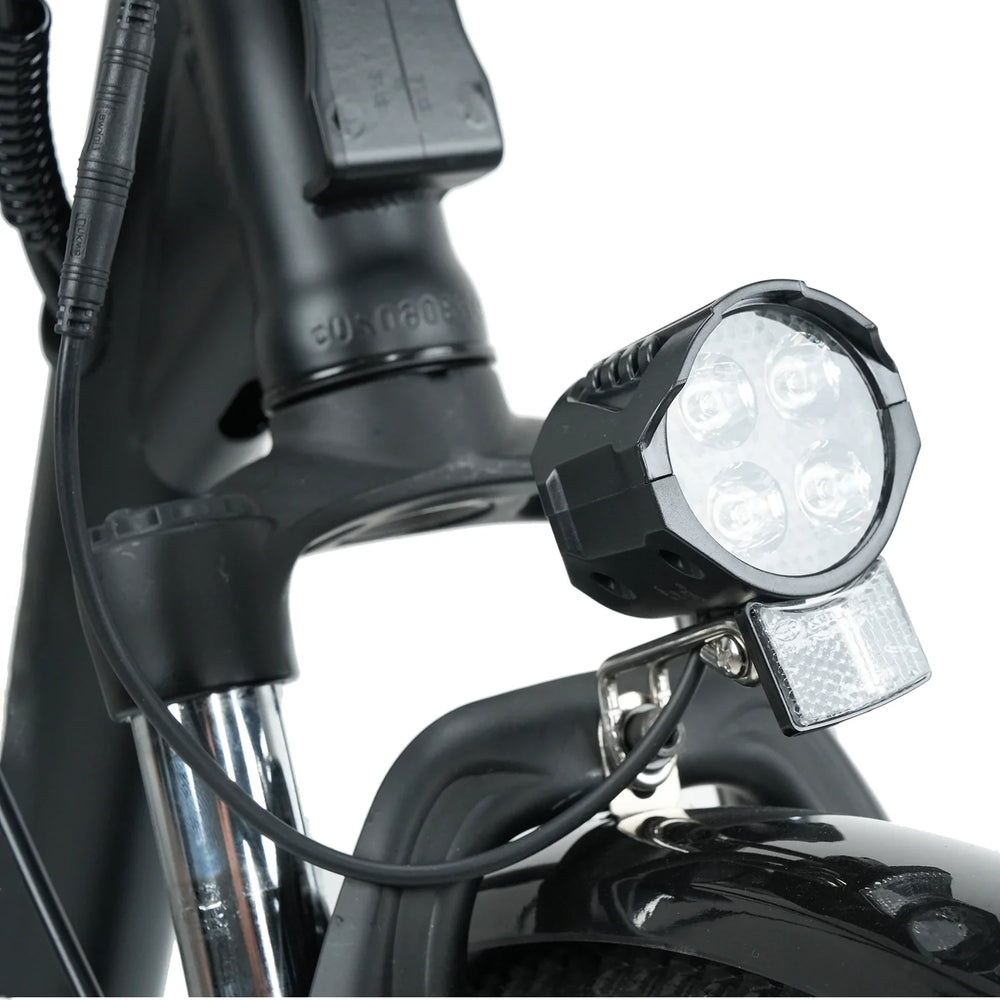 Close-up of a bicycle light attached to the handlebar