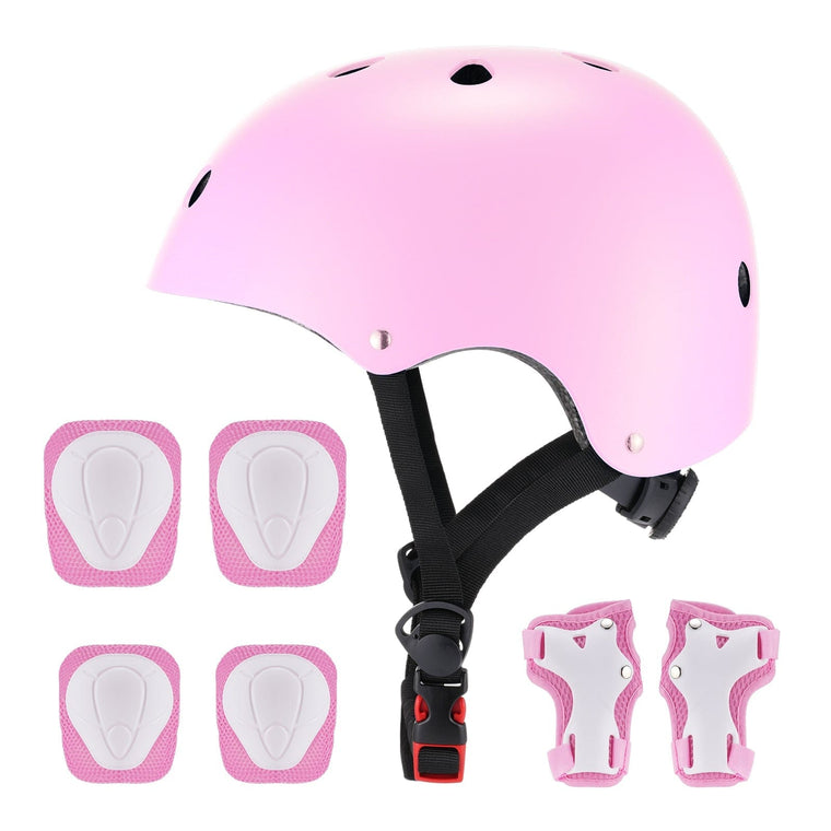 A pink safety helmet with black straps is accompanied by four matching pink and white knee or elbow pads and two wrist guards, all designed for protective sports gear.