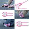 A series of images showcasing pink protective gear, including wrist, elbow, and knee pads. The gear is worn over a thick, beige sweater and jeans, with close-ups highlighting the adjustable straps and padding. The pads are set against a gray pavement background.