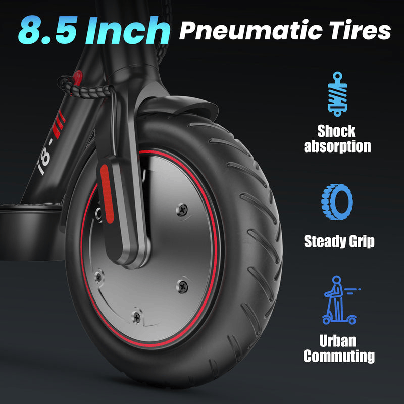Close-up of an 8.5-inch pneumatic tire on an i8 electric scooter, featuring a sleek black design with red accents. The image highlights benefits like shock absorption, steady grip, and suitability for urban commuting.