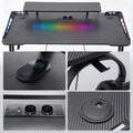 CyberCart Cybercart RGB Gaming Desk with Z-Shaped Sturdy Steel Frame & Carbon Fiber Textured Surface, Ergonomic PC Computer Desk for Gamers-Pre-Order