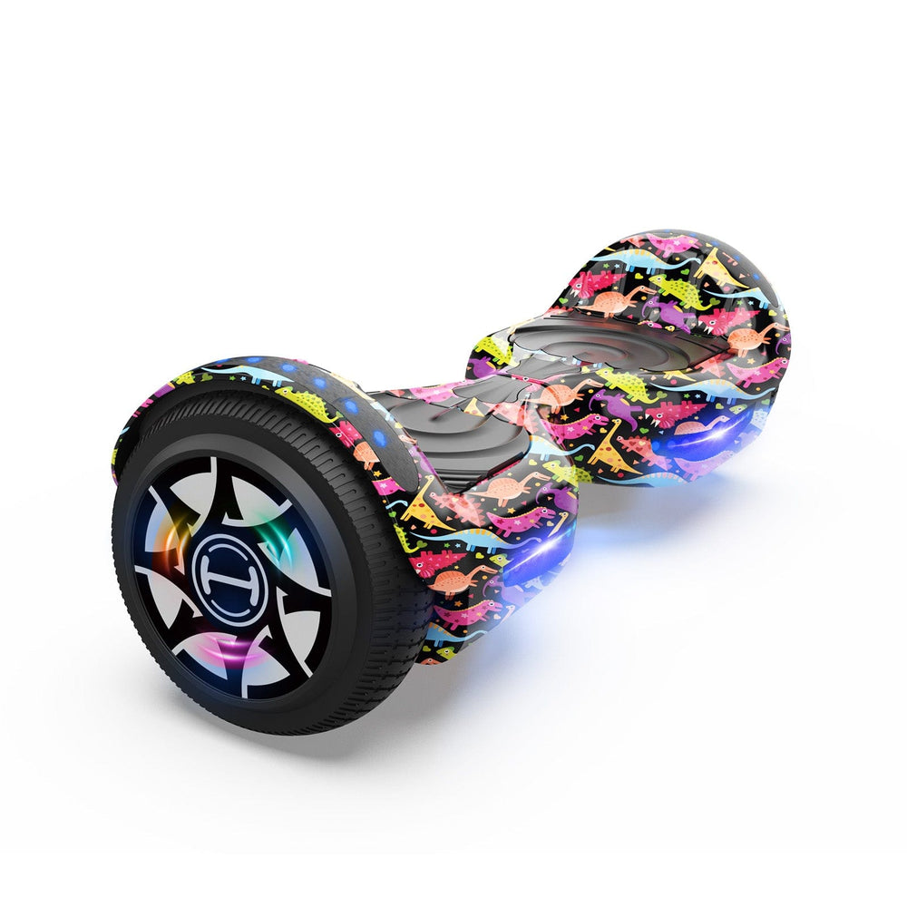 The iHoverboard Hoverboard for Kids, 6.5" Self-Balancing with Bluetooth LED Lights and blue footpad glow, CE Certified-H1, is shown at an angle on a white background featuring multicolored graffiti-style graphics and bright LED wheel lights.