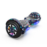 The iHoverboard Hoverboard for Kids, 6.5" Self-Balancing with Bluetooth LED Lights (CE Certified-H1), has a black base with colorful stars, moons, and planets, vibrant LED wheels, textured foot pads for grip, and a bright blue underglow.
